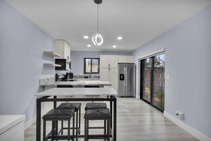 Welcome to this beautifully remodeled 2 bedroom, 1.5 bathroom - photo 3