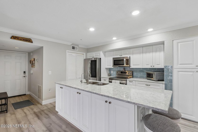 What a Belleza Beauty! This exceptional first-floor, waterfront - photo 12