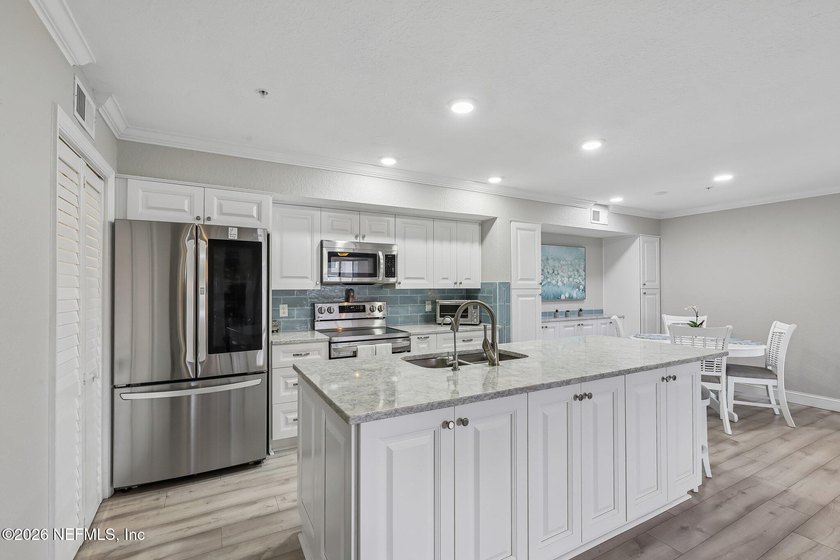 What a Belleza Beauty! This exceptional first-floor, waterfront - photo 13
