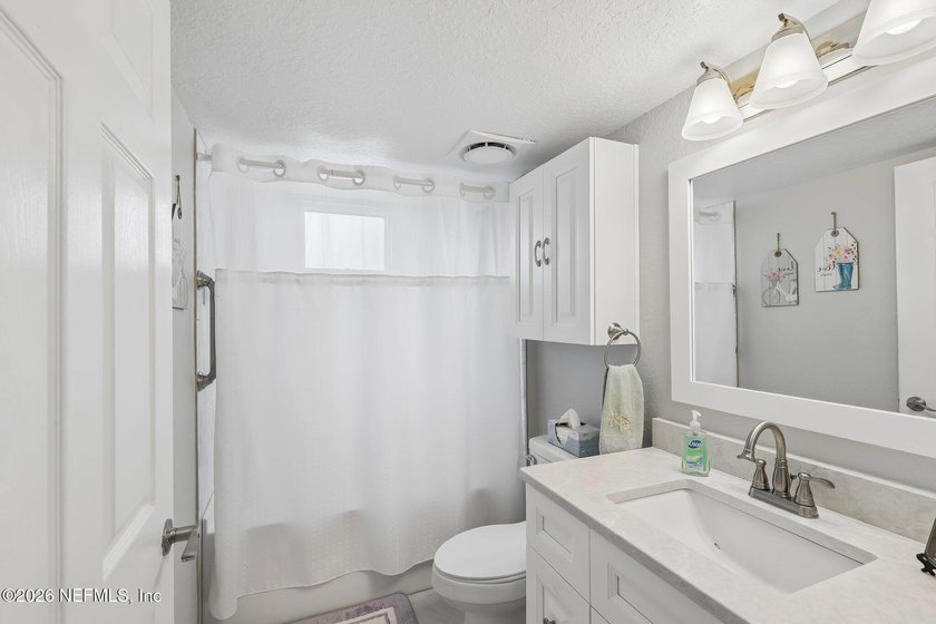 What a Belleza Beauty! This exceptional first-floor, waterfront - photo 22