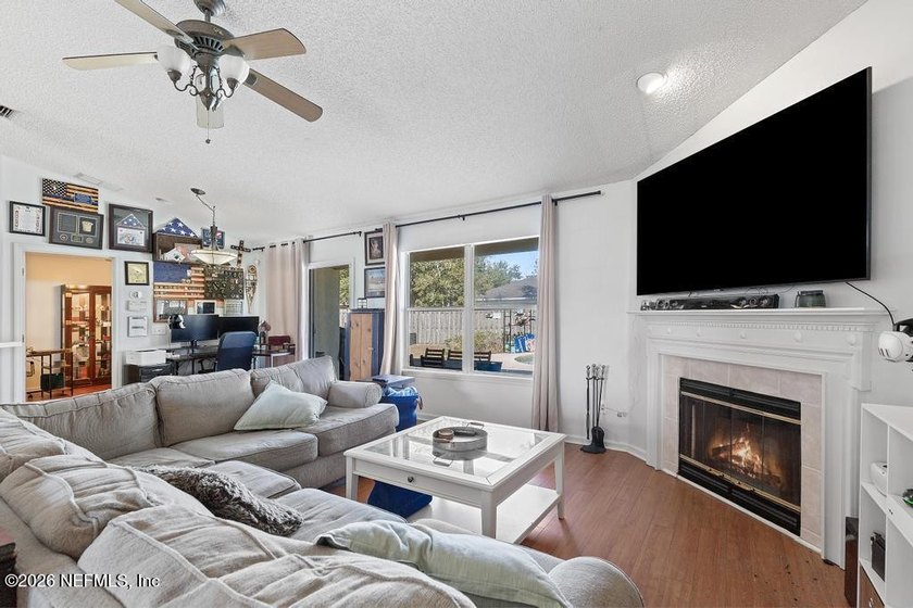 A home with a backyard and in-ground pool on a cul de sac. Check - photo 5