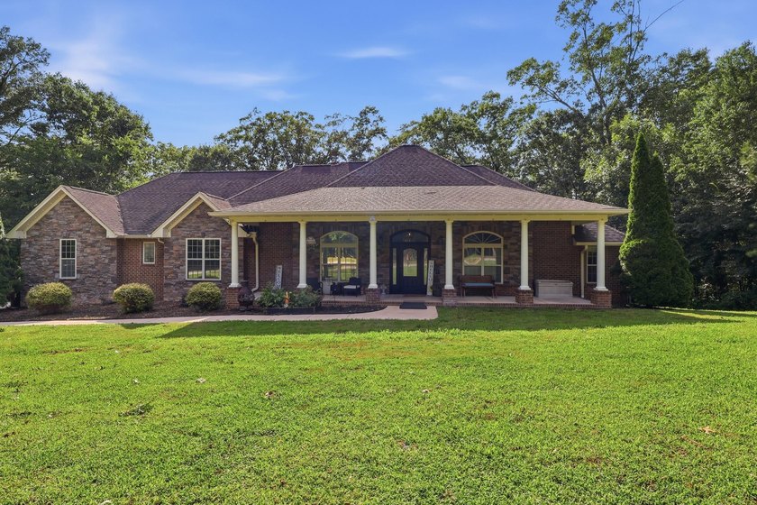 Custom-built 6BR/5BA home near the water with an easy commute to - photo 2