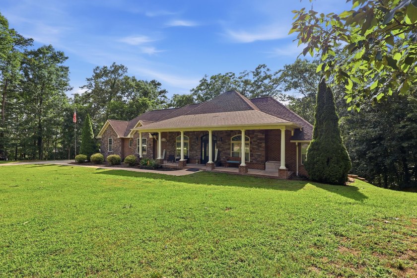 Custom-built 6BR/5BA home near the water with an easy commute to - photo 3