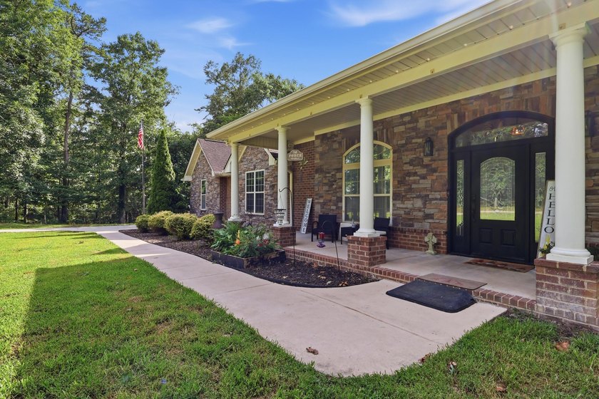 Custom-built 6BR/5BA home near the water with an easy commute to - photo 5