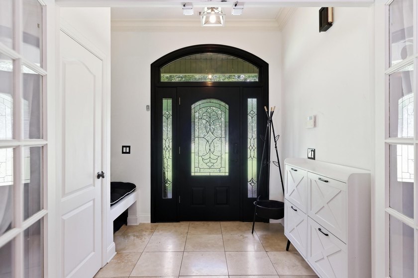 Custom-built 6BR/5BA home near the water with an easy commute to - photo 6