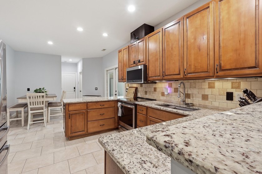Custom-built 6BR/5BA home near the water with an easy commute to - photo 10