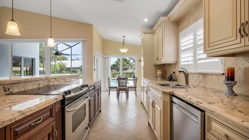 Welcome to Boca Woods Country Club. Exceptional updated home - photo 12