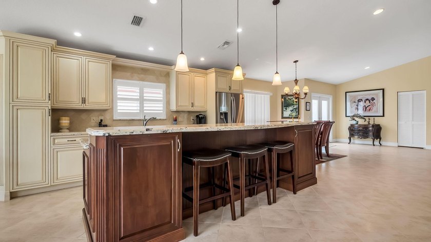 Welcome to Boca Woods Country Club. Exceptional updated home - photo 13