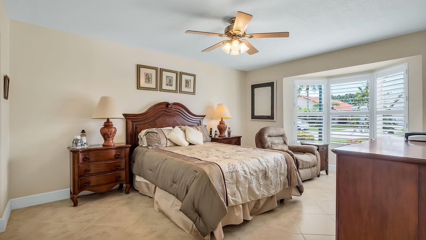 Welcome to Boca Woods Country Club. Exceptional updated home - photo 25