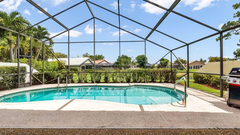Welcome to Boca Woods Country Club. Exceptional updated home - photo 32