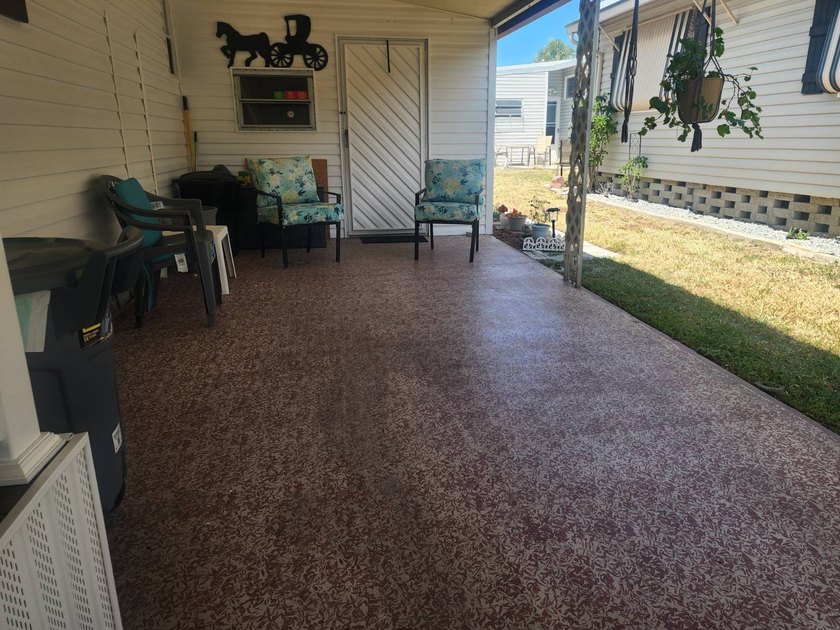 Welcome to this charming manufactured double-wide in the very - photo 3