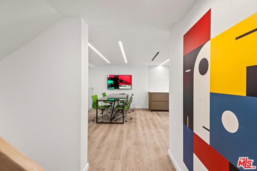 This extensively renovated front-facing multi-story townhome - photo 10