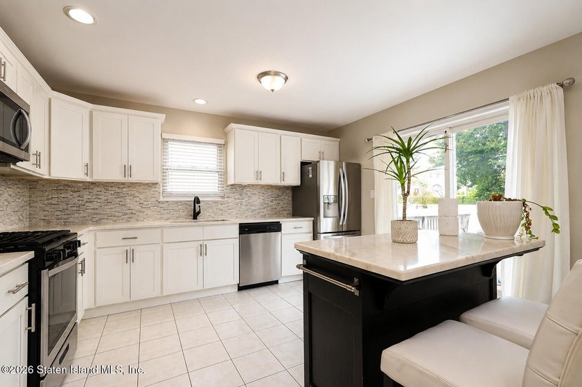 Welcome to 285 Lockman Avenue, a spacious and beautifully - photo 14