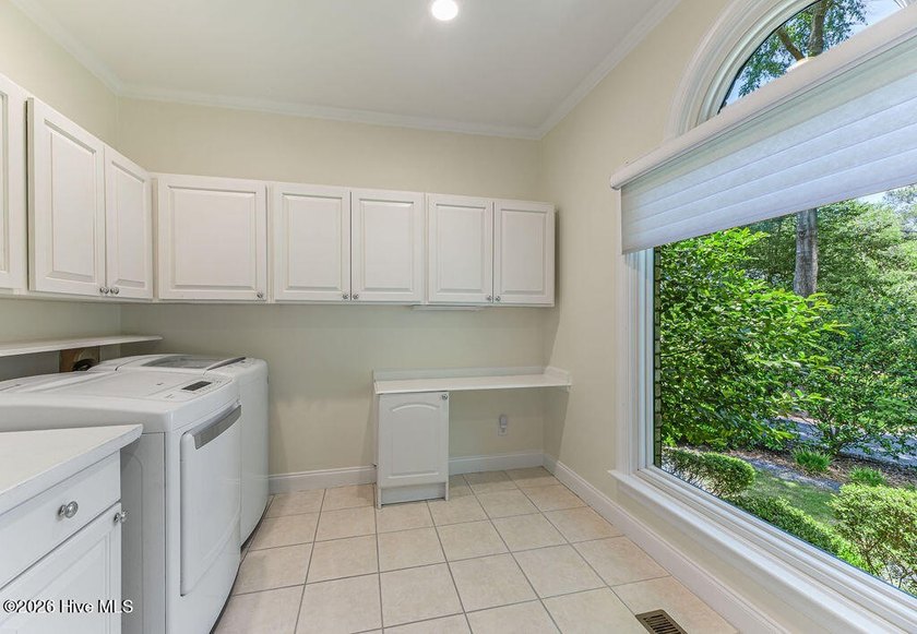 PRICED $65,000 BELOW APPRAISED VALUE Trophy Home in the heart of - photo 27