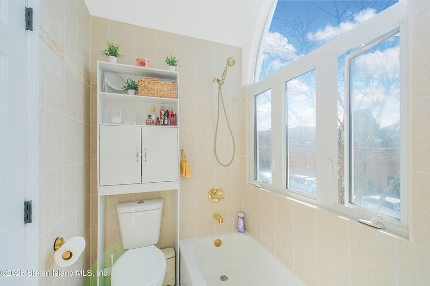 Fully gut-renovated 3 bedroom home in heart of 10309. Features a - photo 22