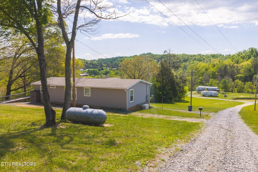 Unrestricted Country Living Meets Modern Comfort: Your 1-Acre - photo 2