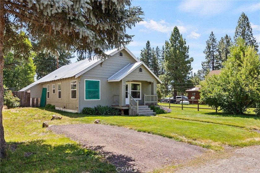 Charming and inviting, this 3-bedroom, 1-bath home offers a - photo 2