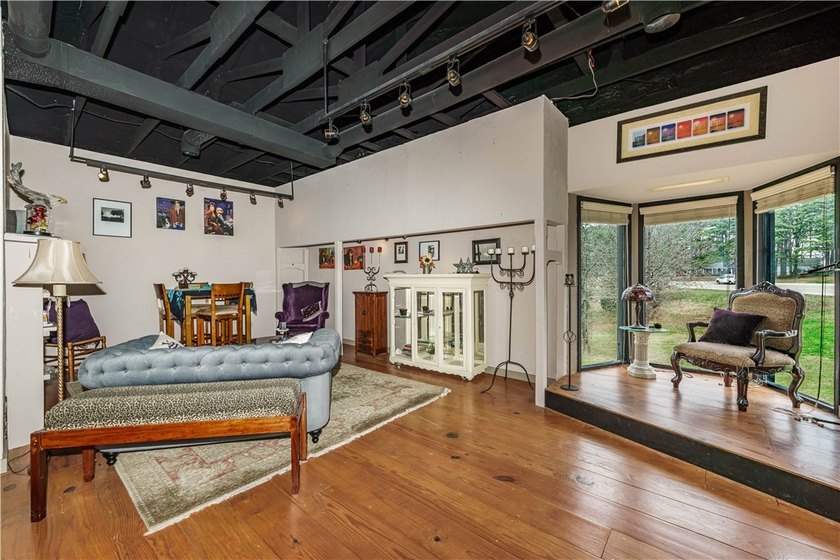 Don't let the front fool you-this 3,000+ sq. ft. property is far - photo 3