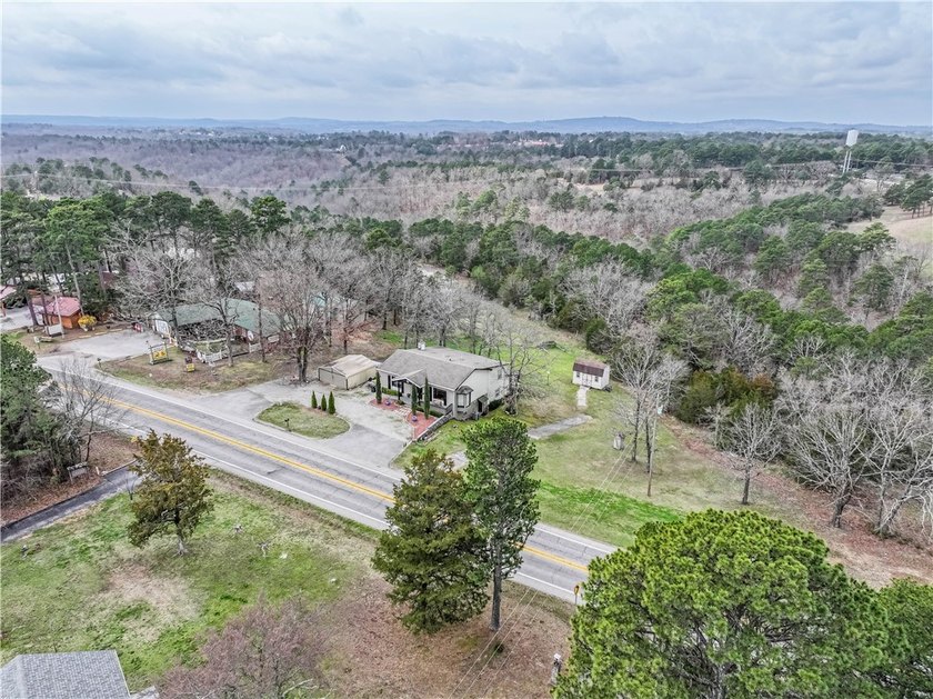 Don't let the front fool you-this 3,000+ sq. ft. property is far - photo 8