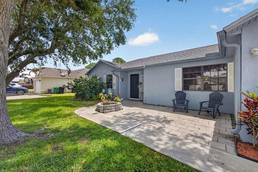 Welcome to this charming single-story residence in Port st Lucie - photo 7