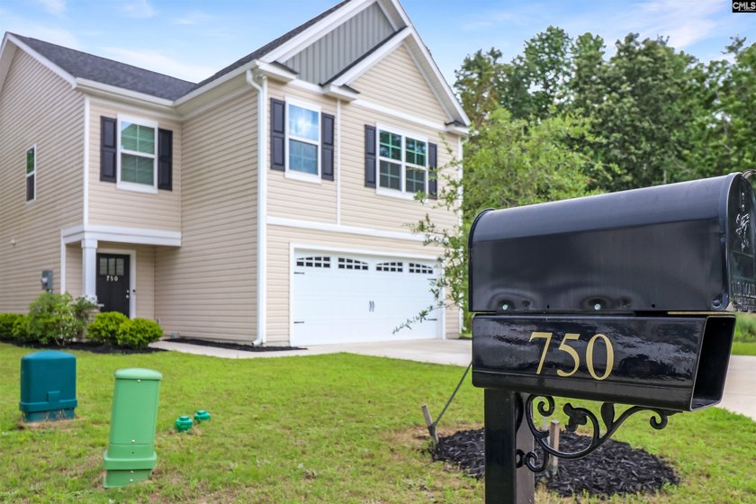 Welcome to Wimbee! This inviting 4-bedroom, 2.5-bath home sits - photo 2