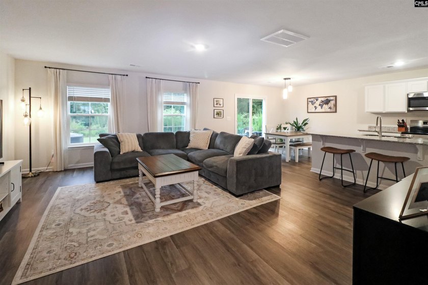 Welcome to Wimbee! This inviting 4-bedroom, 2.5-bath home sits - photo 8