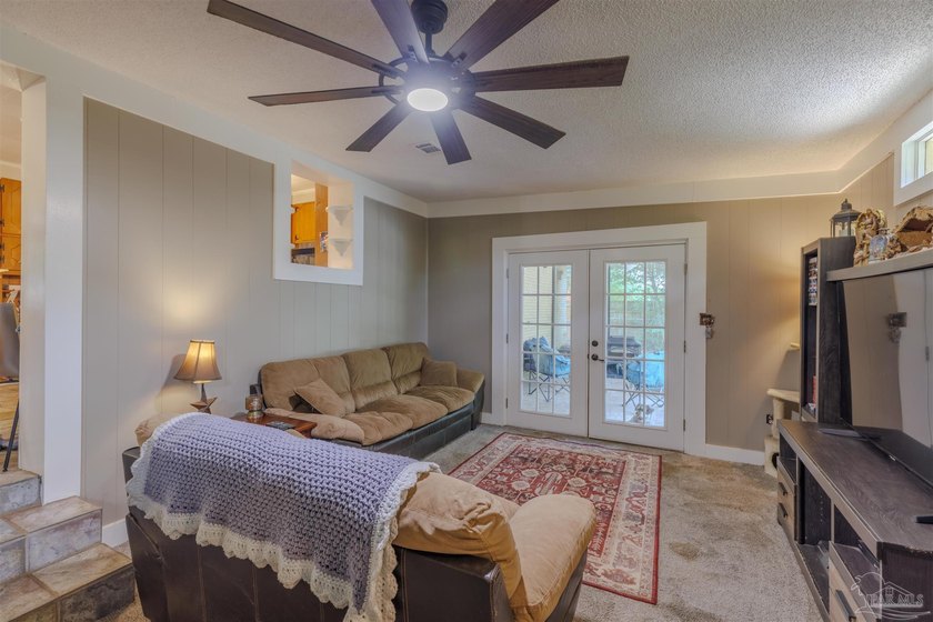 Welcome home to 902 N 75th Avenue, a charming property that - photo 15