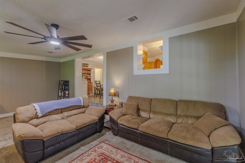 Welcome home to 902 N 75th Avenue, a charming property that - photo 16