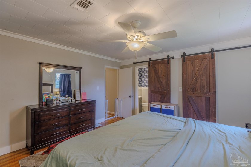 Welcome home to 902 N 75th Avenue, a charming property that - photo 19