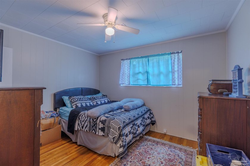 Welcome home to 902 N 75th Avenue, a charming property that - photo 22