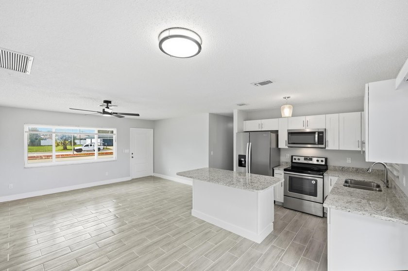 Completely redone and ready to impress! This 3BR/2BA home has - photo 12