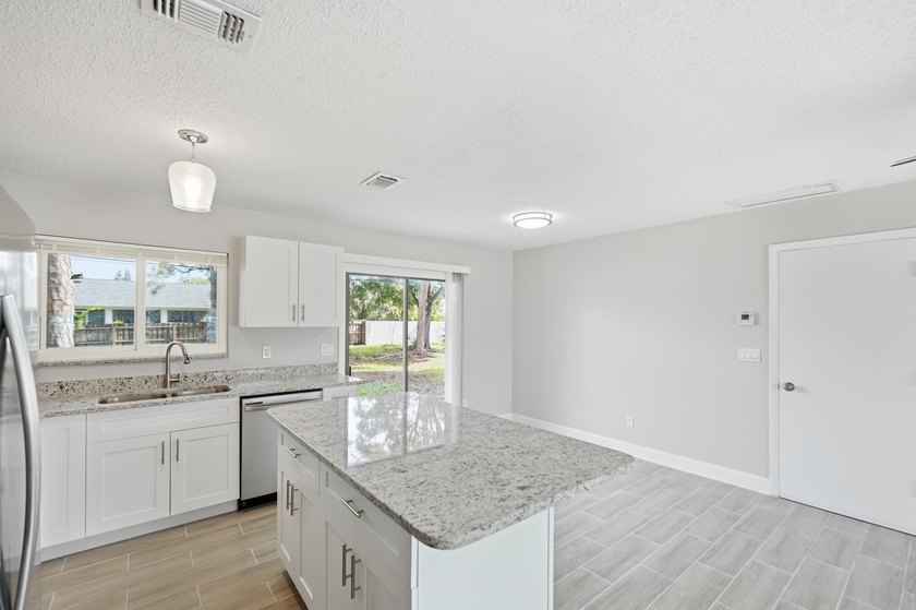 Completely redone and ready to impress! This 3BR/2BA home has - photo 13