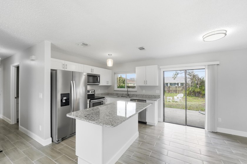 Completely redone and ready to impress! This 3BR/2BA home has - photo 15