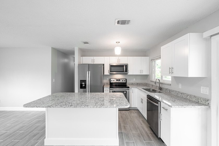 Completely redone and ready to impress! This 3BR/2BA home has - photo 16