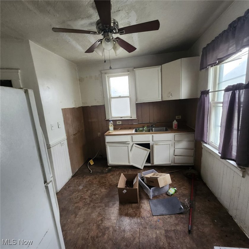 Opportunity awaits with this duplex featuring an upper unit that - photo 17