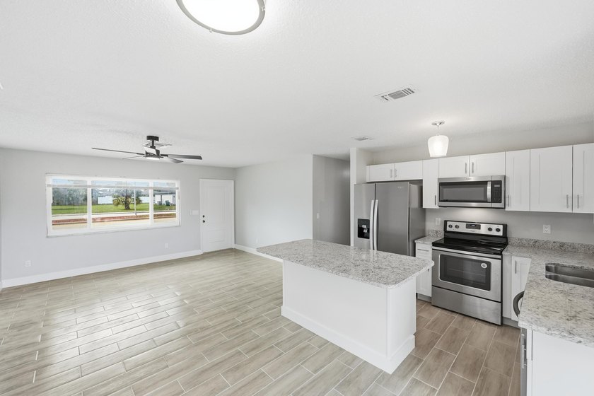 Completely redone and ready to impress! This 3BR/2BA home has - photo 17
