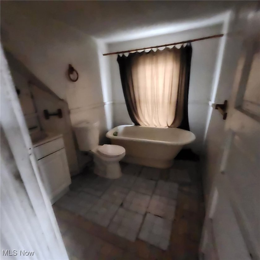 Opportunity awaits with this duplex featuring an upper unit that - photo 18