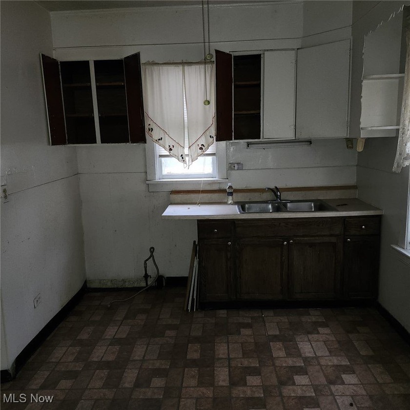 Opportunity awaits with this duplex featuring an upper unit that - photo 23