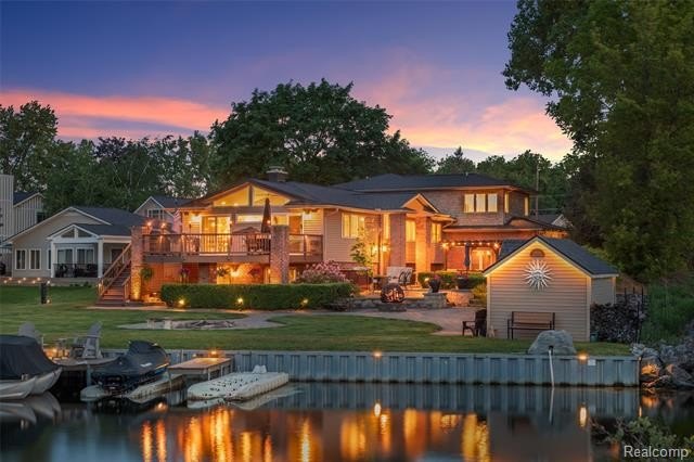 Situated in one of the most coveted waterfront settings on the - photo 3