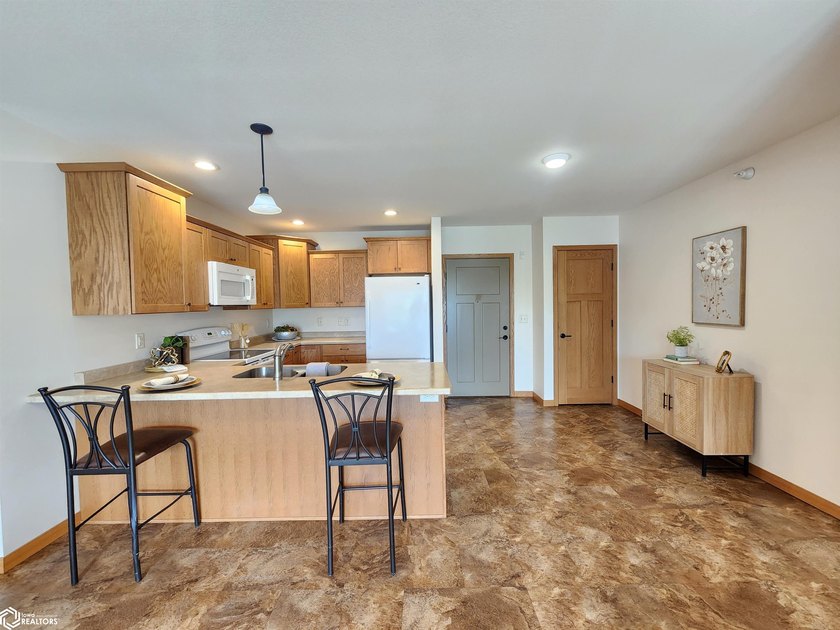 LUXURY LIVING AT AN AFFORDABLE PRICE! GARDEN PARK VILLAGE CONDOS - photo 2