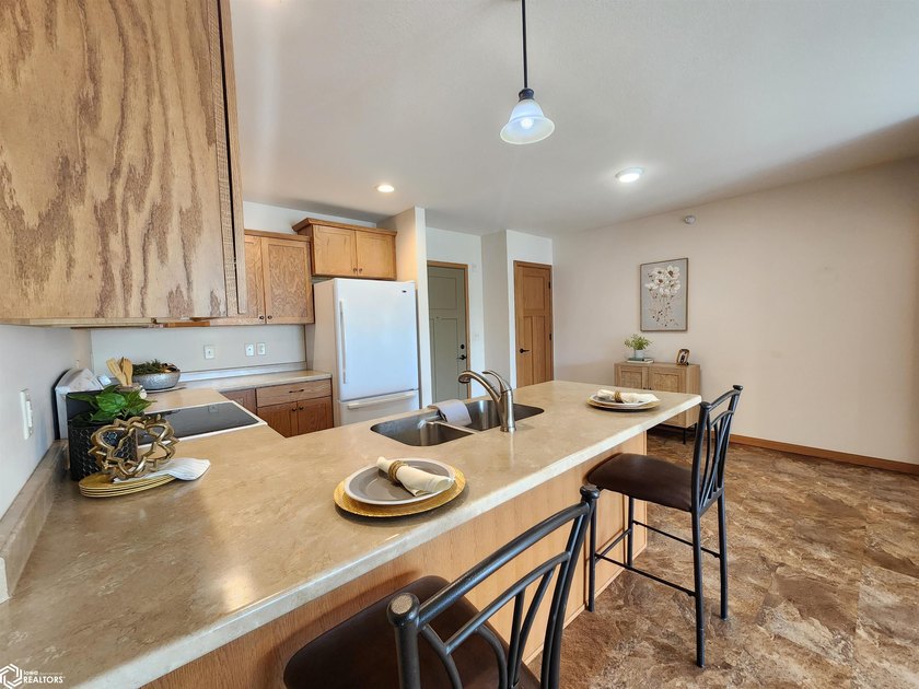 LUXURY LIVING AT AN AFFORDABLE PRICE! GARDEN PARK VILLAGE CONDOS - photo 4