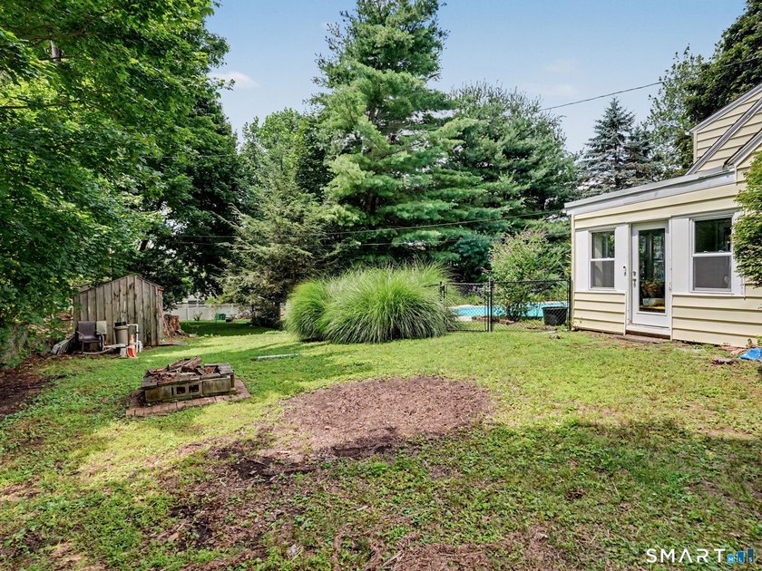 Welcome home to this charming Cape nestled in a sought-after - photo 25