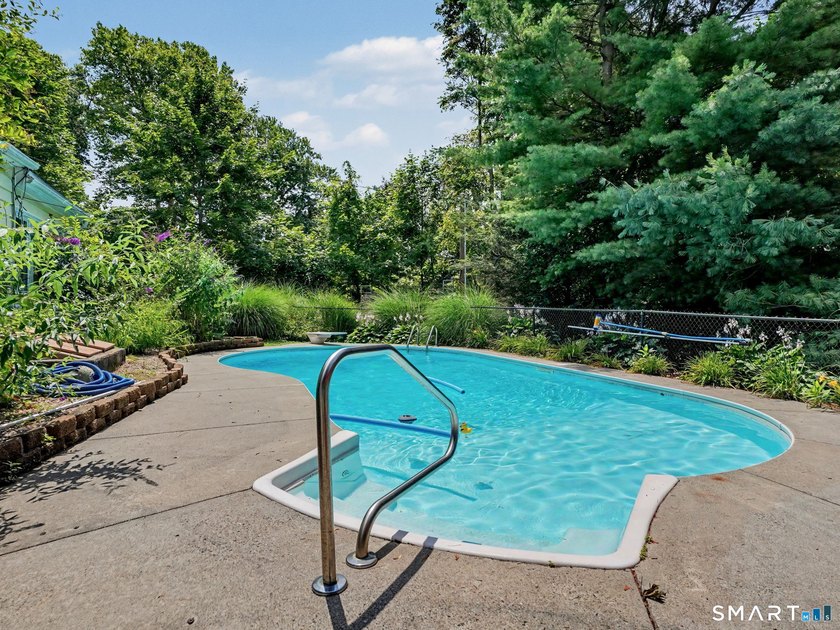 Welcome home to this charming Cape nestled in a sought-after - photo 27