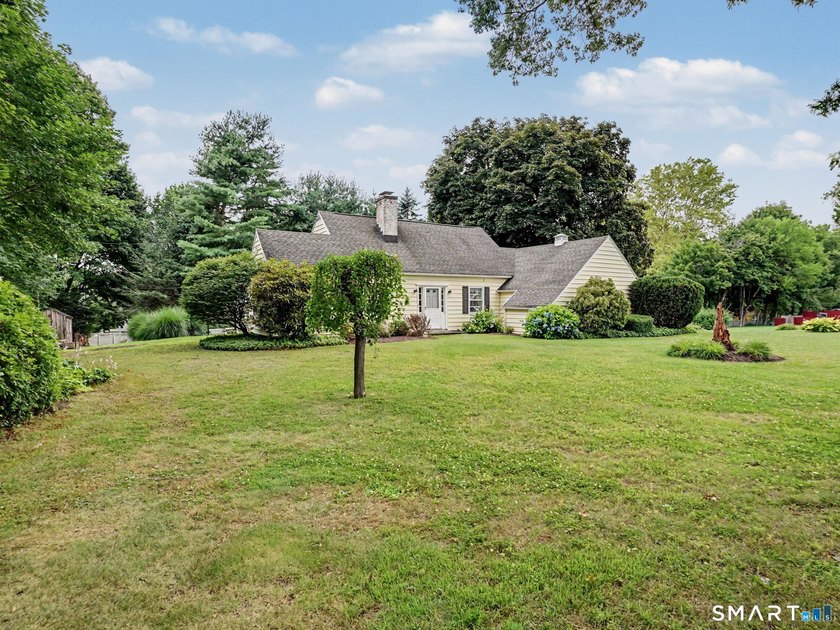Welcome home to this charming Cape nestled in a sought-after - photo 36
