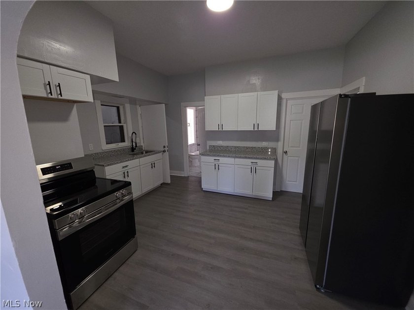 Prime opportunity to add this renovated 5-unit asset to your - photo 11