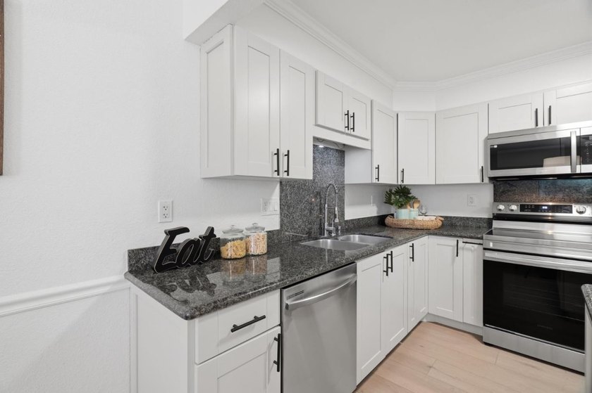 Welcome to 3826 Panda Lane, a beautifully updated condominium - photo 12