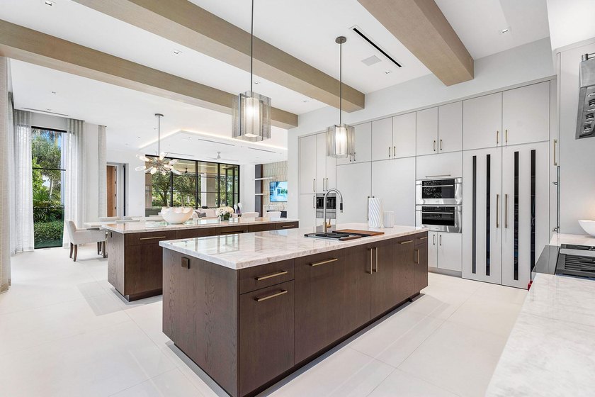 Located in the prestigious Royal Palm Yacht &amp; Country Club, this - photo 18