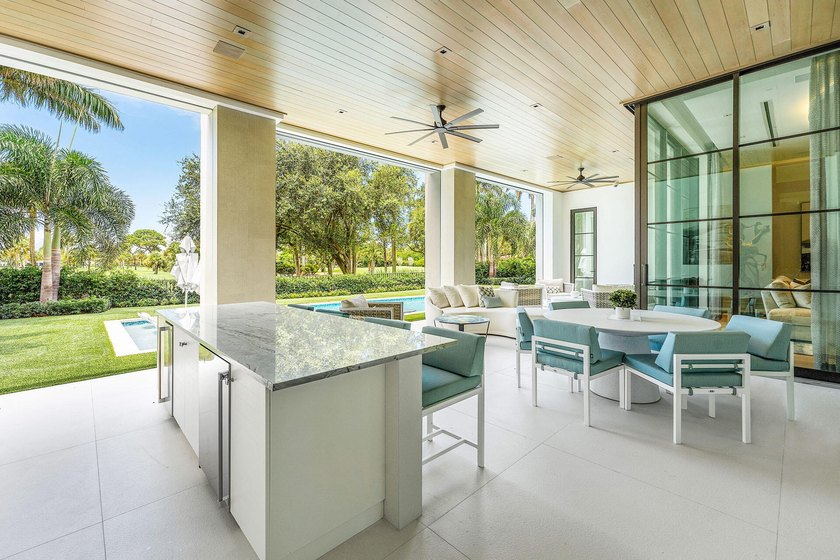 Located in the prestigious Royal Palm Yacht &amp; Country Club, this - photo 20