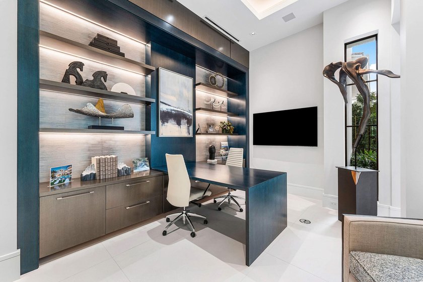 Located in the prestigious Royal Palm Yacht &amp; Country Club, this - photo 34