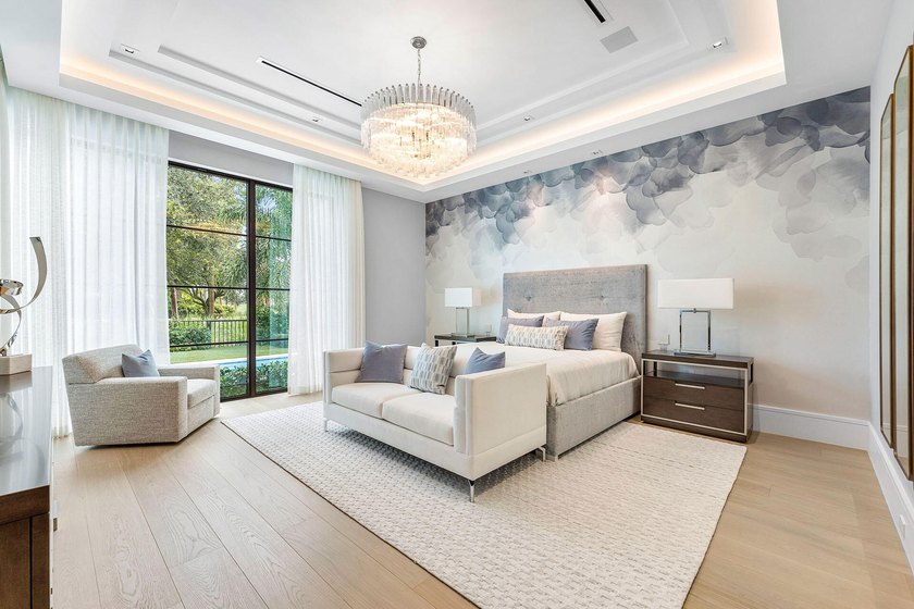 Located in the prestigious Royal Palm Yacht &amp; Country Club, this - photo 37